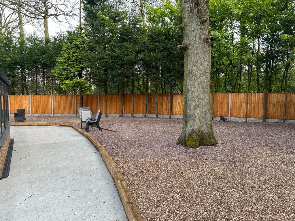 A Gravel Driveway with an oak tree in the centre